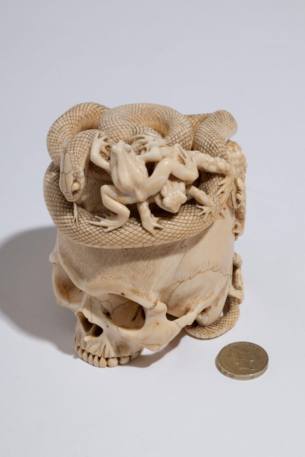 Japanese Ivory Skull with Coiled Snake and Toads